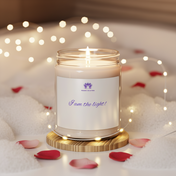 Scented candle in a glass jar with a label on a wooden coaster, surrounded by rose petals and string lights.